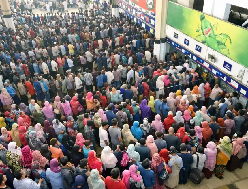 Eid Train Ticket Rush at Bangladesh Railway Station 2026 ঈদুল ফিতর উপলক্ষে বাংলাদেশ রেলওয়ে স্টেশনে অগ্রিম টিকিট কিনতে যাত্রীদের দীর্ঘ ভিড়